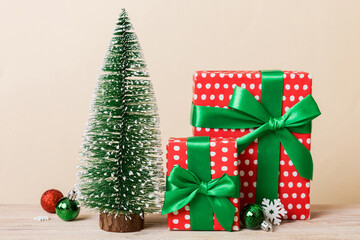 Christmas composition. craft Gift box, small tree, branches and craft DIY decorations on white background. New year concept. Christmas home decoration Flat lay, top view, copy space