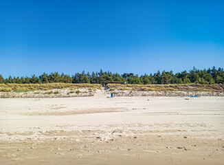 Empty Baltic Sea beach at summer in Białogóra, Poland.