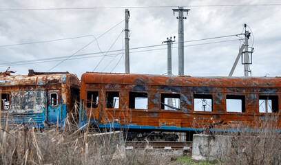 burned out blown up wagons in Ukraine