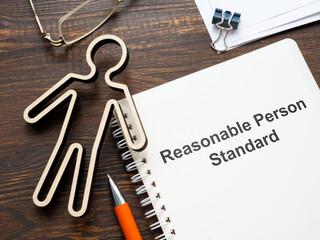 Figurine and document about Reasonable person standard. - obrazy, fototapety, plakaty