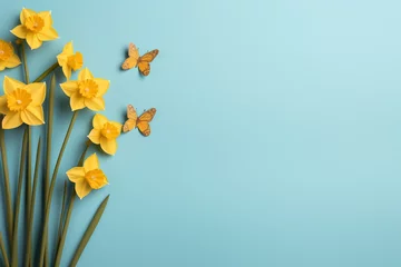 Fotobehang Minimal light blue spring background with daffodils © Alicia