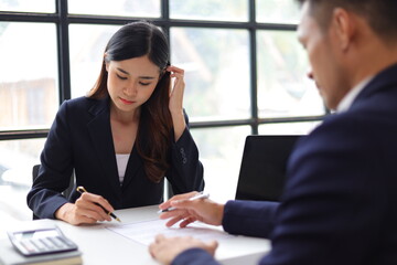 Manager reading resume while interviewing new employee candidates in office, job interview. - obrazy, fototapety, plakaty