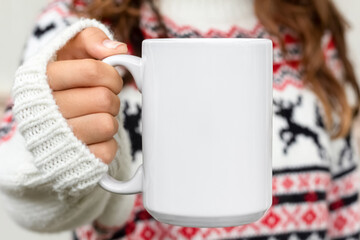 Girl is holding white mug in hands with christmas sweater. Blank 15 oz, big ,large  white xmas copy...
