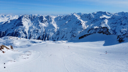 Snowy mountains in  sunny on the ski area. Snowboarding and ski area. Tirol. Austria. Travel concept