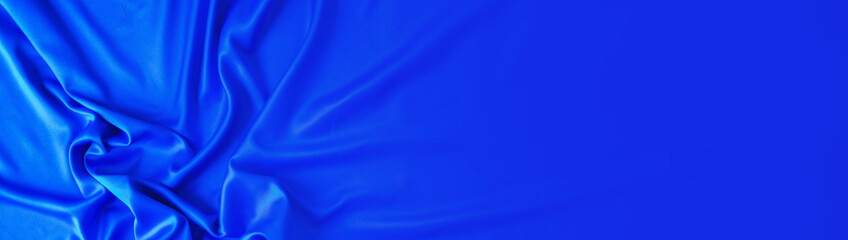 blue silk background. abstract banner copy space