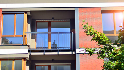 Green community. Eco apartment building saving energy and fresh air concept. Block of flats in beautiful green public