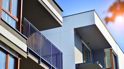 Brand new apartment building on sunny day. Modern residential architecture. Modern multi-family...