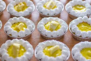 Durian cupcakes and bright yellow durian, Thai cake recipe made from durian, beautifully decorated and ready to eat. Special day celebration ideas.