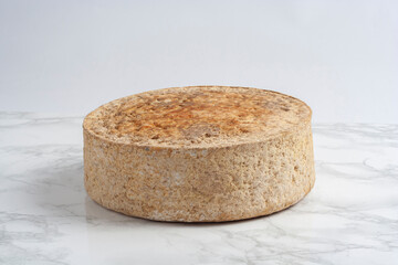 Whole cheese from Alt Urgel, cured cheese, Catalonia, Spain.