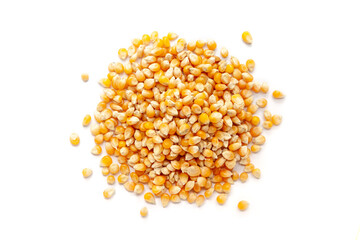 Pile of organic Corn Seeds (Zea mays) or Makka isolated on a white background. Top view - obrazy, fototapety, plakaty