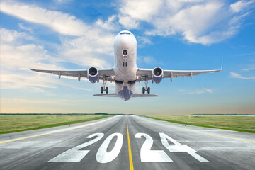Inscription on the runway 2024 surface of the airport road yellow line take off airplane. Concept...