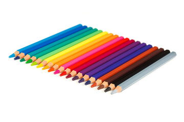 set of multi-colored pencils on a white background