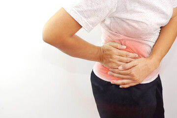 Woman suffering from waist or hip pain on white background. Chronic gastritis, office syndrome and...