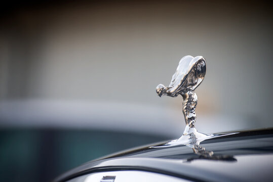Mulhouse - France - 8 October 2023 -  Closeup of Rolls royce emblem on the front car parked in the street