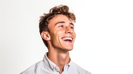 Fototapeta premium Portrait of handsome smiling young man looking up