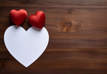 Large white heart with space to write a greeting card. Wooden background with copy space. Valentine's Day.