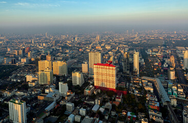 Fototapeta na wymiar Morning sunrise over Bangkok city in Ratchaprasong district in 2012 Bangkok city, Thailand