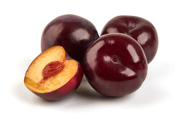 Isolated plums. One and a half of red plum fruit, isolated on white background.
