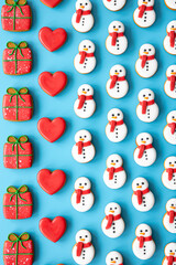 Christmas gingerbread on a blue background, flat lay.