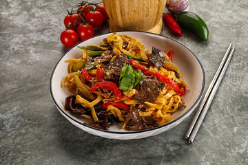Asian wok with noodle, vegetables and beef