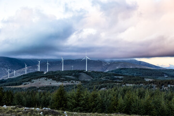 A wind farm or wind park, is a group of wind turbines used to produce electricity. This particular wind farm is located on the mountains of Italy and it allows to realize clean energy. enviromental