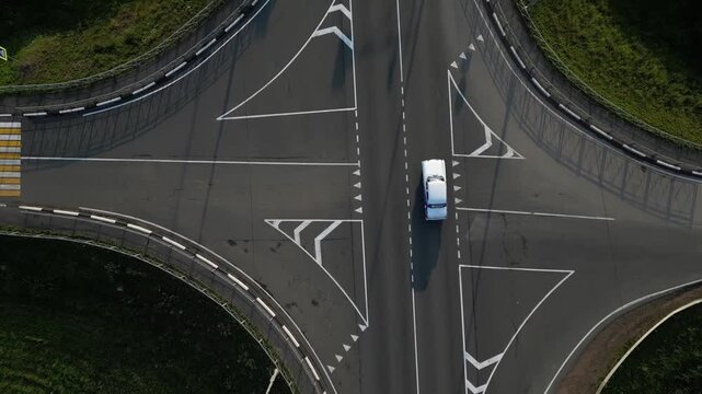 Aerial Tracking Shot of White Car Driving Fast on Highway. Chasing the Hijacker