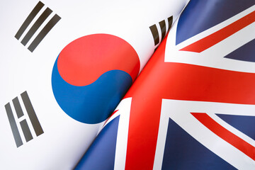 Background of flags of south korea and Great Britain. The concept of interaction or counteraction between two countries. International relations. political negotiations. Sports competition. - obrazy, fototapety, plakaty