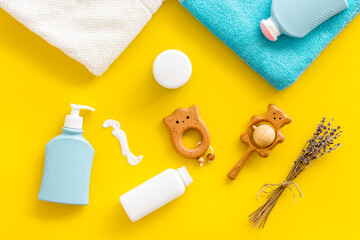 Baby bath accessories and cosmetic products, top view