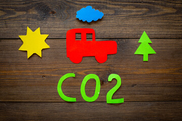 Kids paper car and traffic fumes - CO2 carbone dioxide control concept