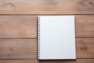 writing materials on a wooden surface