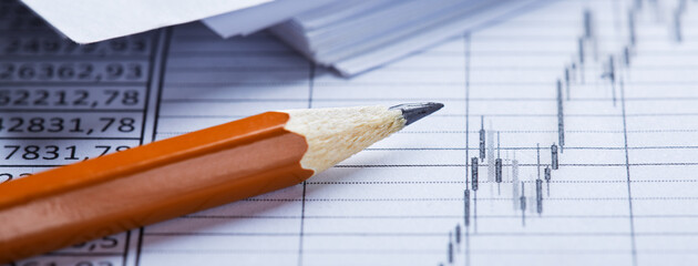 Accounting document with pencil, financial diagram and checking financial chart. Concept of...