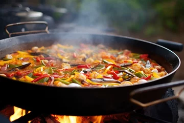 Foto op Canvas close-up of cooking spanish paella in a large pan © Alfazet Chronicles