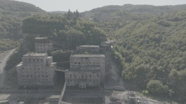 Aerial View of Derelict Ore Mining facility in Chiatura, Georgia. Flat image, D-log prores