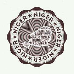 Niger seal. Country round logo with shape of Niger and country name in multiple languages word cloud. Artistic emblem. Radiant vector illustration.