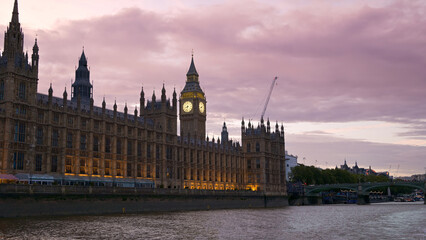 Fototapeta na wymiar View of Westminster from a floating boat in London at sunset, United Kingdom