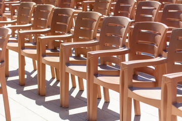 Plastic chairs in the concert hall