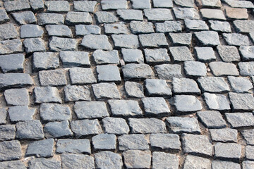 Stone pavement on the sidewalk as an abstract background. Texture