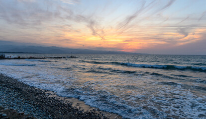 Obraz premium Mediterranean sunset in autumn 2023, beach in the evening 18