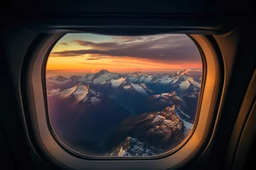 Foto op Canvas View from the airplane illuminator, mountains covered with snow © stock_acc