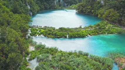 Plitvice Lakes National Park conserves a strikingly beautiful and intact series of lakes formed by...