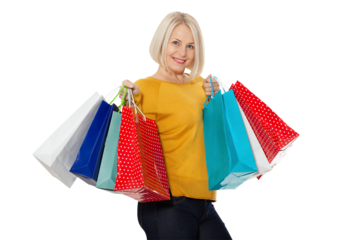 Shopper. Shopaholic shopping woman holding many shopping bags excited isolated on white.