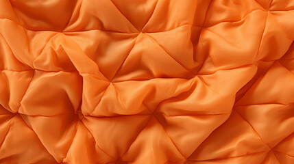 A soft, quilted texture with warm tones of orange