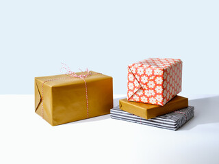 Holiday present packages on gray background with copy space