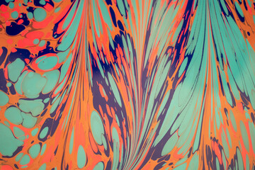 Oil-based inks in a tank of water being prepared for marbling. Paper marbling is a method of...