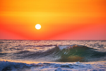 Beautiful green sunrise wave and cloudscape over the sea, sunrise shot - 659581596