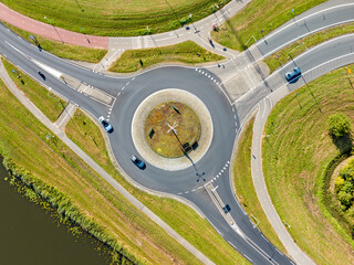 Aerial top down view of roundabout traffic in Amsterdam, Netherlands - obrazy, fototapety, plakaty