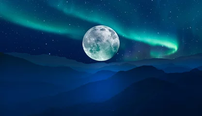 Cercles muraux Pleine Lune arbre Beautiful landscape with blue misty silhouettes of mountains - Northern lights (Aurora borealis) over the mountains with super full moon - "Elements of this image furnished by NASA"