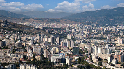 Fototapeta premium Aerial view of a large modern city with tall buildings