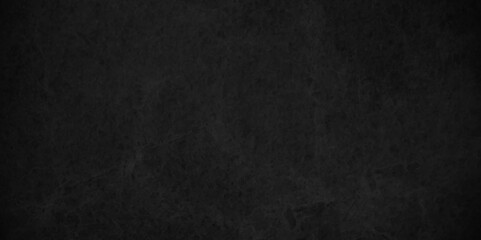 Obraz premium Black stone wall texture grunge rock surface. dark gray concrete background backdrop. wide panoramic banner. old wall stone for dark black distressed grunge background wallpaper rough concrete wall.