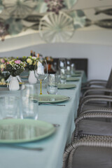 Cozy Interior Of Summer Cafe - Sheltered Tables With Tablecloths